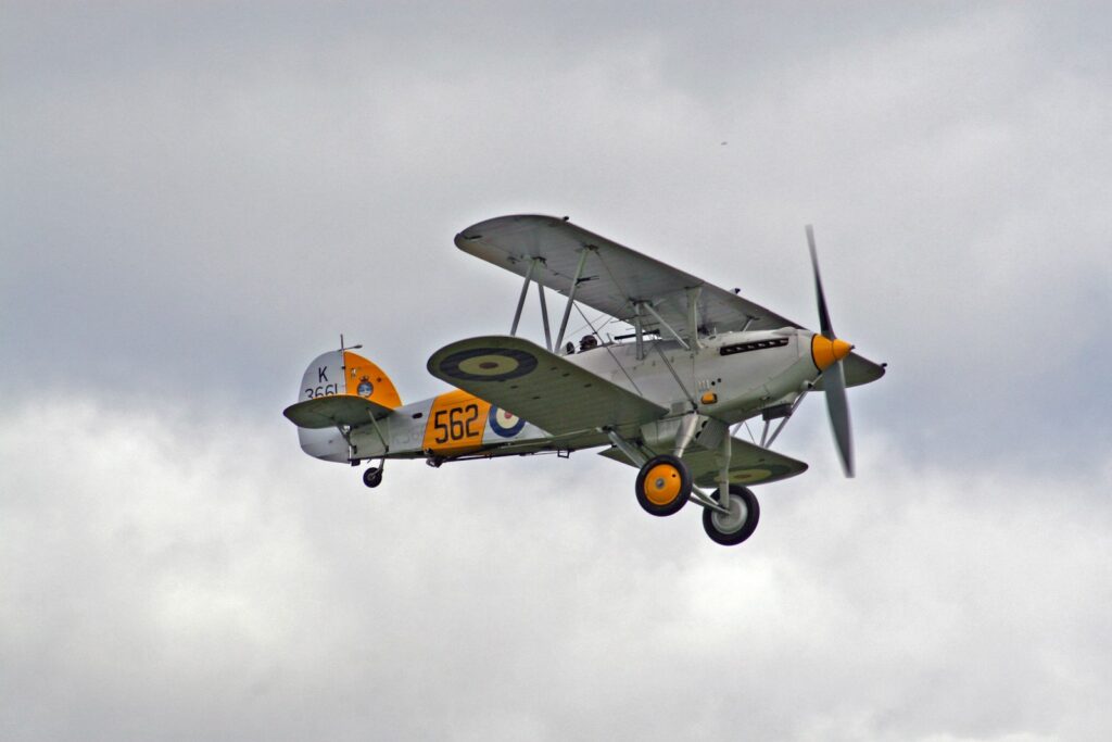 Biplane in mid air, representative image