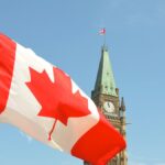 Canadian flag on Parliament Hill Ottawa, representative image
