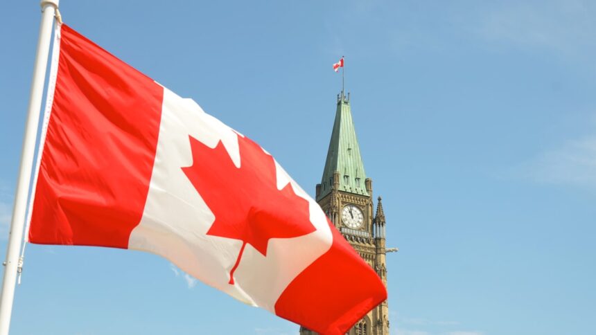 Canadian flag on Parliament Hill Ottawa, representative image