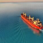 Cargo ship at middle of ocean, representative image