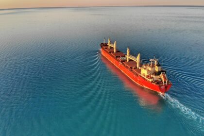 Cargo ship at middle of ocean, representative image
