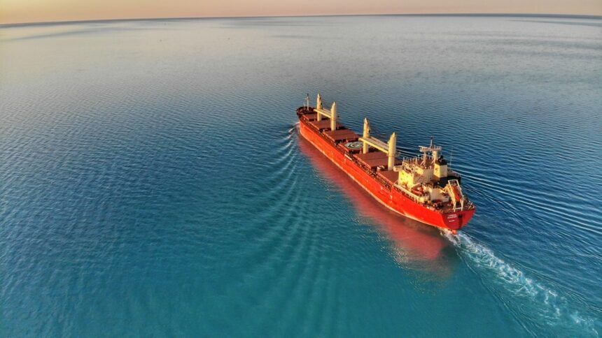 Cargo ship at middle of ocean, representative image