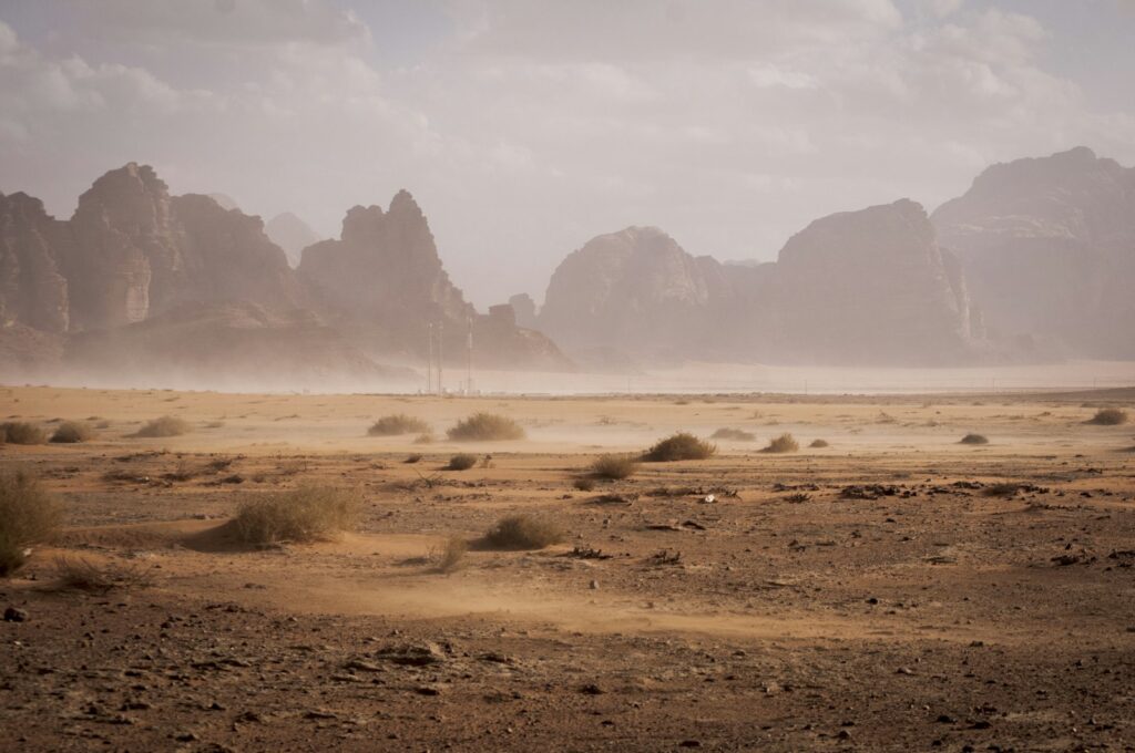 Dusty desert valley, representative image