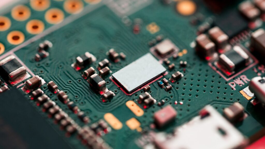 Green and black circuit board, representative image