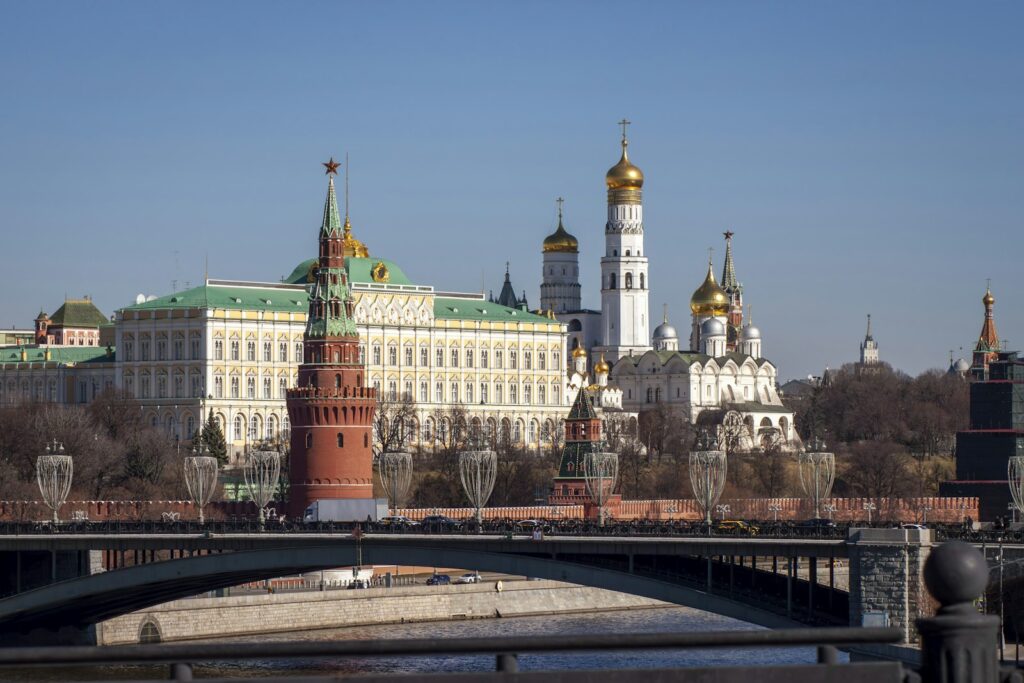 Moscow Kremlin complex with golden domes, representative image