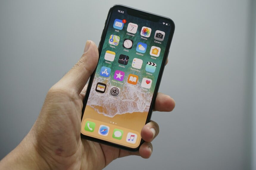 Person holding a smartphone, representative image