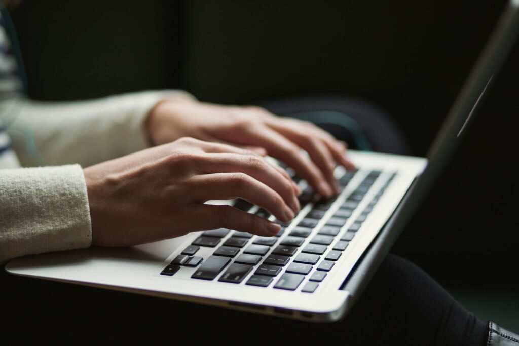 Person using a laptop, representative image