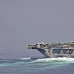 US Navy ships transit the Strait of Hormuz