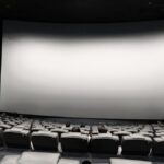Empty cinema movie theater auditorium with screen