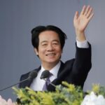 Taiwanese President Lai Ching-te waves during National Day celebrations in Taipei
