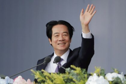 Taiwanese President Lai Ching-te waves during National Day celebrations in Taipei