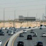 Traffic on a road with the Riyadh skyline behind, file photo