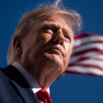 President Donald Trump speaks with reporters on the White House South Lawn before boarding Marine One