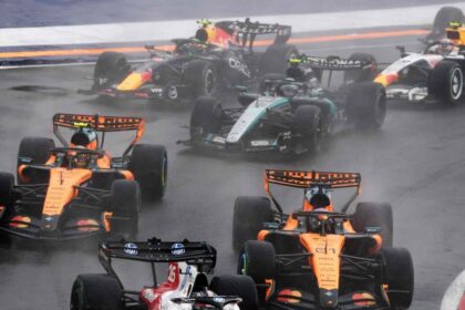 Max Verstappen wins the rain-hit Singapore sprint race